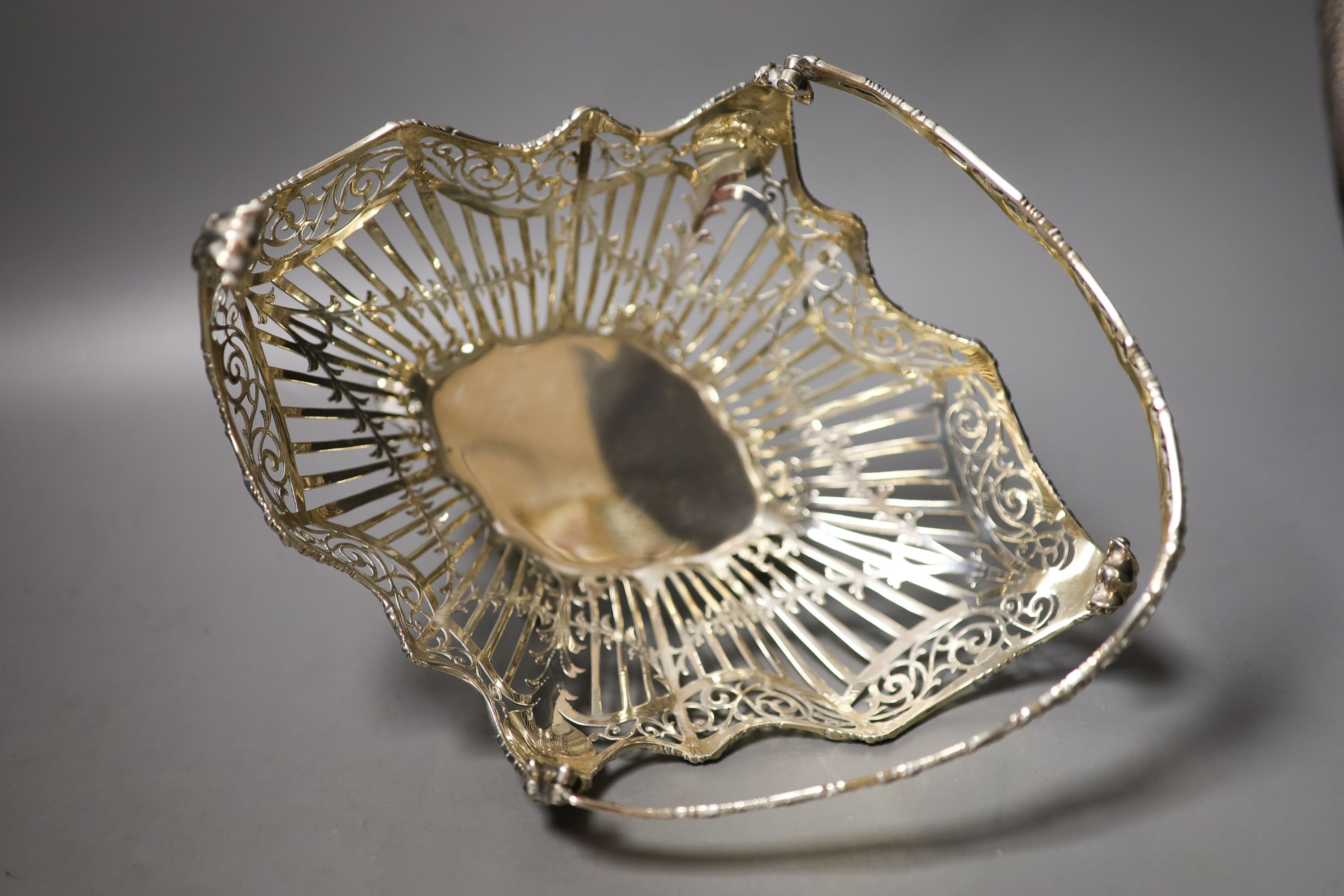 A George V pierced silver oval fruit basket, Josiah William & Co, London, 1920, length 25.5cm, 16oz.